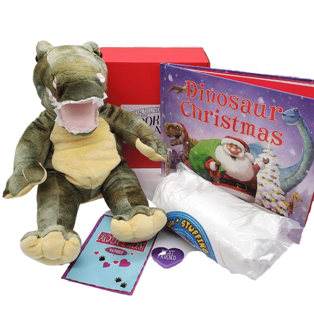 Christmas Dinosaur Book and Bear Box with a Dinosaur to easily build yourself, a picture book, and a Christmas gift surprise. Shown outside box with white background.